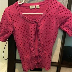 Pink cardigan with dark purple polka dots